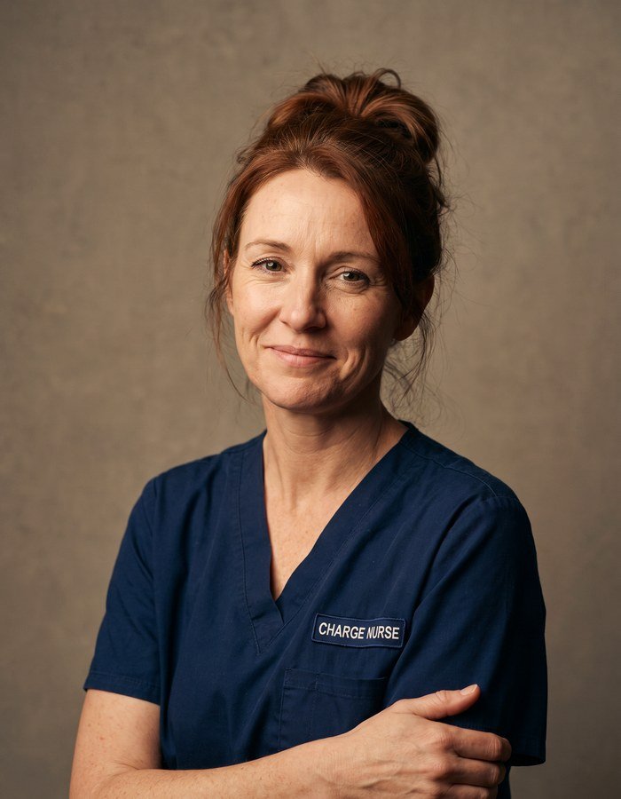 Portrait of a woman in a navy blazer